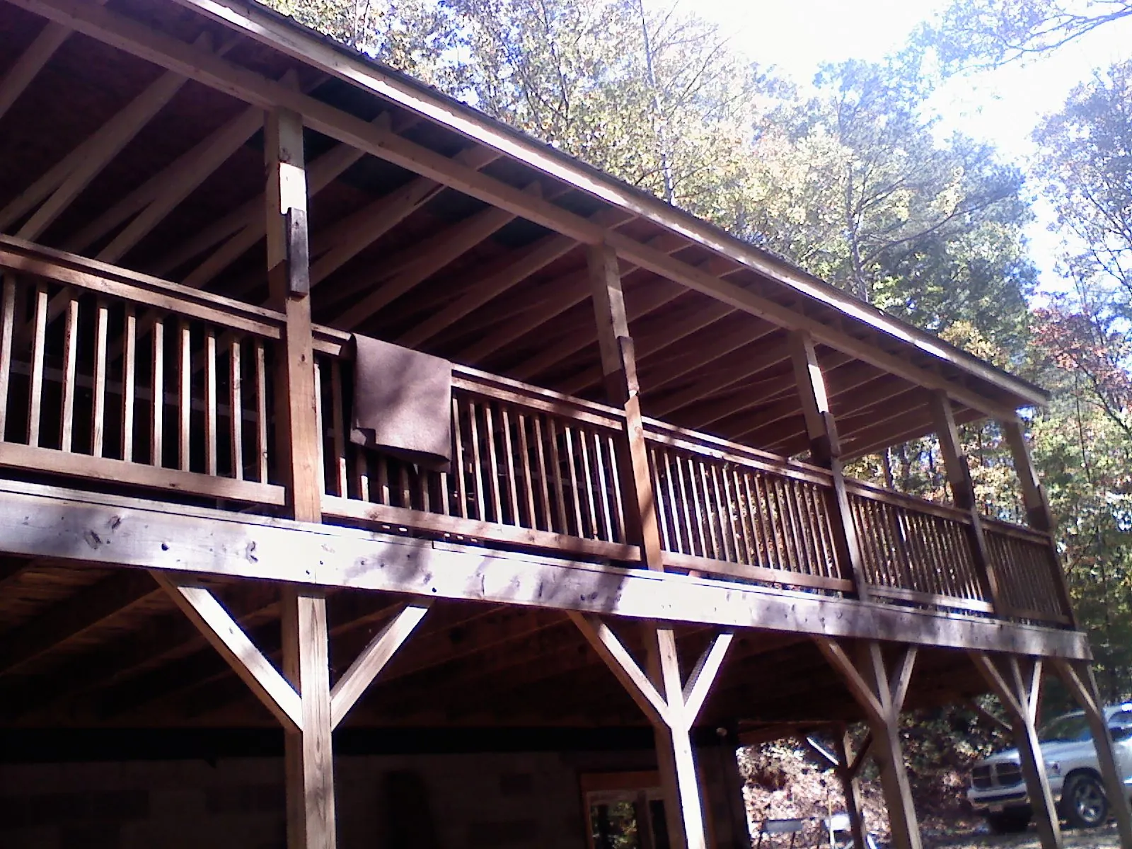 Timber framing under a new elevated porch and deck — Roof Leak Repair in Melissa by Roofing Brothers